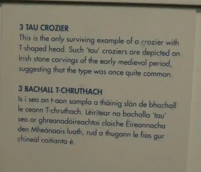 Phallic design on a tau crosier